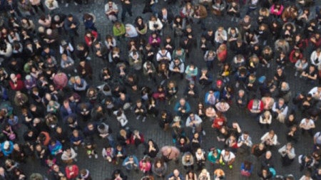 Drone photo looking down at a crowd assembled below