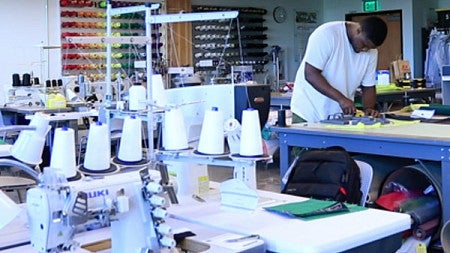 Armani Brumfield works on sportswear in the Innovation Lab