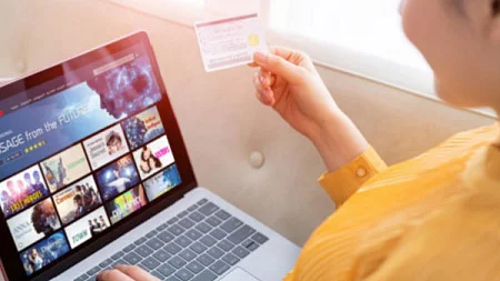 A person browses an internet streaming service
