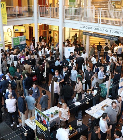 An event takes place in the atrium Lillis Business Complex, taken looking down from a higher storey