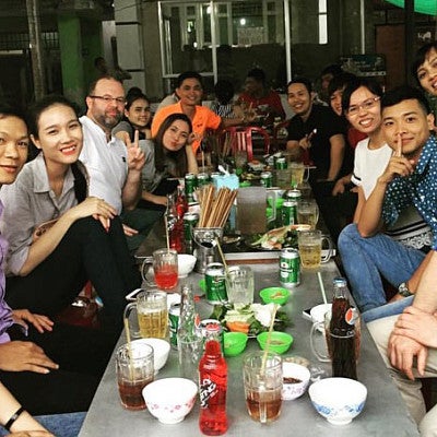Sports Product Management interns at dinner in Vietnam