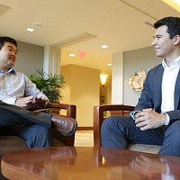 A student meets with an employer