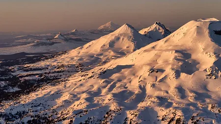 an aerial view of Oregon's Sisters mountains
