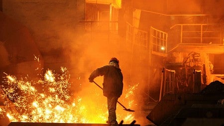 a person working in a steel mill