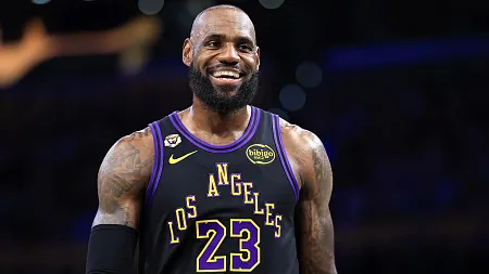Lebron James smiling wearing his game jersey