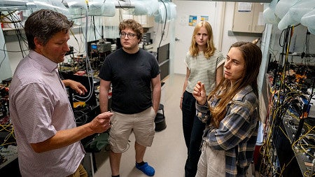 people speak in a lab