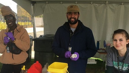 Student sustainability ambassadors support a plastics round-up recycling event.