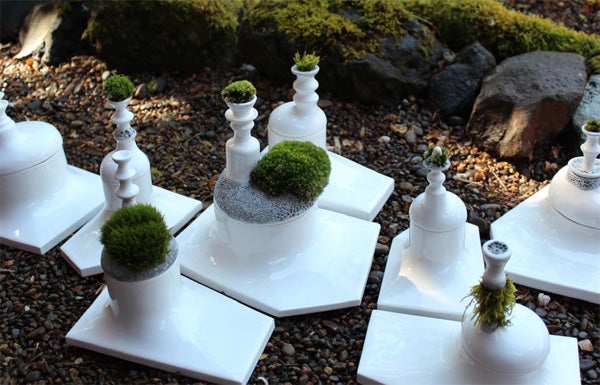 “Bryophyte Edition 1: Growing Platforms,” slip cast porcelain, white and textured glaze, moss, largest platform 10.25” x 7.5” x 7.5.” This project, by Trygve Faste and fellow UO faculty member Jessica Swanson, “began as a conceptual exploration into using mosses as aesthetic surfaces for functional ceramics,” Faste says. “Because mosses are fragile organisms that only grow outside in certain climates, we developed a system of storage containers that would allow the user to grow tiny moss gardens outside and then bring them into the home on special occasions for a limited amount of time.” “Bryophyte Edition 1: Growing Platforms,”