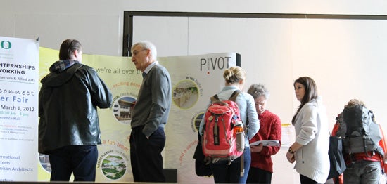 Above: Recruiters from PIVOT Architecture in Eugene talk with students and faculty at the 2012 Recruitment Fair in Lawrence Hall.