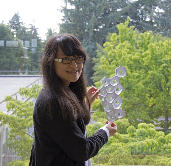 Yin Yu displays a section of her "Open Window Blind." Photograph by Cody Rappaport. Yin Yu