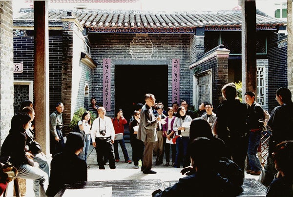 In 2000, Lung founded the Architectural Conservation Programme, an in-service post-graduate degree course in architectural conservation, which has since been responsible for training most of Hong Kong's current generation of conservation professionals. He's pictured here teaching a class. Architectural Conservation Programme
