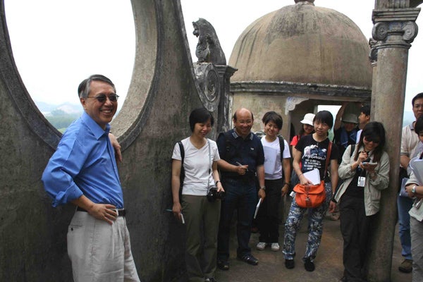 Lung leads a field trip with students. field trip