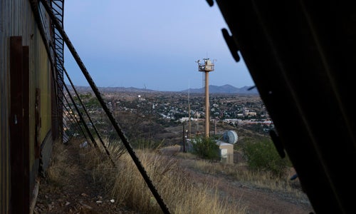 View into Nogales from the Border Fence View into Nogales from the Border Fence (with camera tower), Arizona.