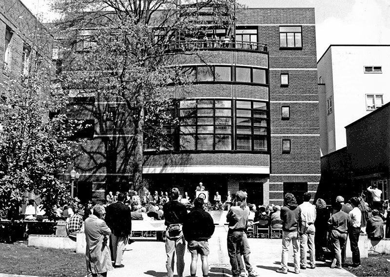 Students, faculty, and staff listen as the new A&AA building project is officially dedicated in 1991.