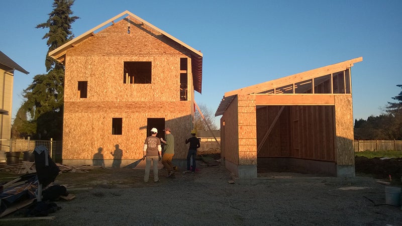 house and garage partially enclosed
