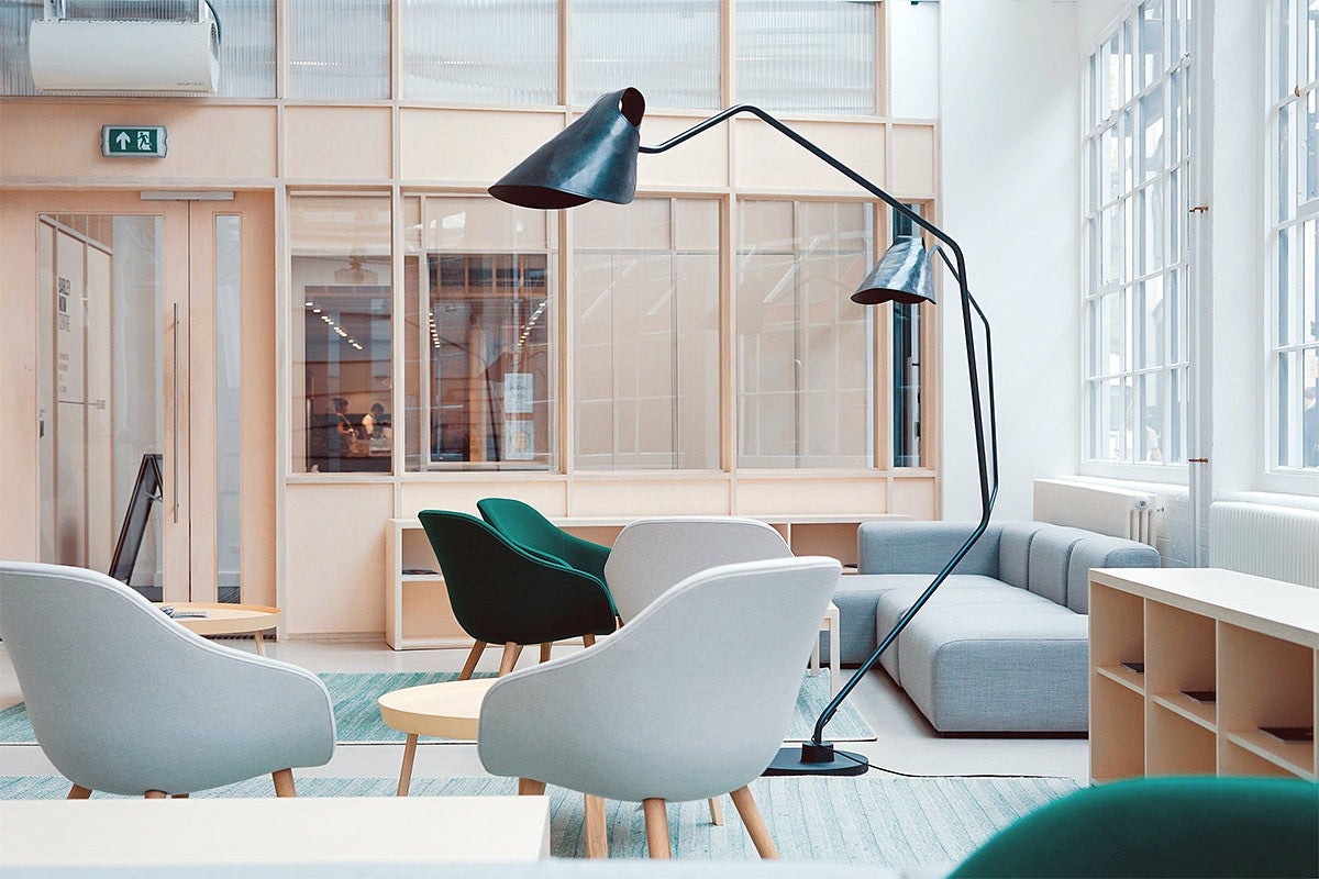 photo of a communal space room with many windows