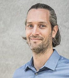 Photograph of Professor of Architecture, Nico Larco. 