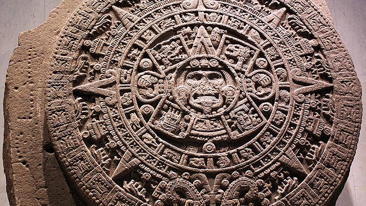 Monolith of the Stone of the Sun, also named Aztec calendar stone (National Museum of Anthropology and History, Mexico City). Wikimedia Commons.