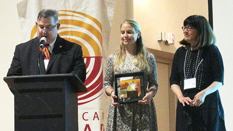 Alison Kwok is honored with the Passive Solar Pioneer Award