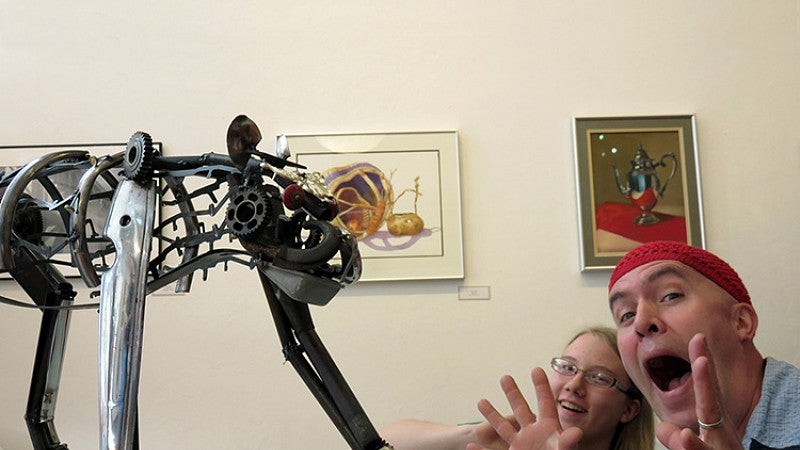 Alyson Brewer (left) and mentor-sculptor Jud Turner come together to show off their final products.
