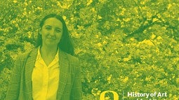 Photograph of Gabby Chitwood in front of a cherry tree.