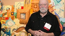 George Green Standing in front of his painting