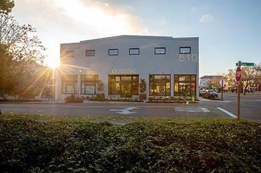 510 Oak building exterior at sunset