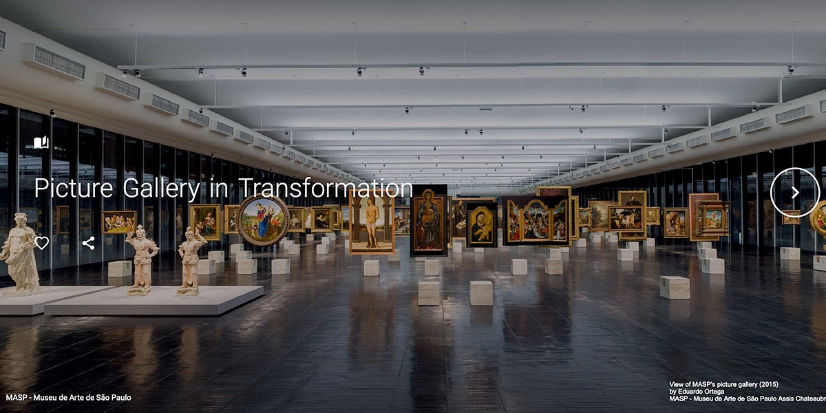 sculptures and paintings in a gallery