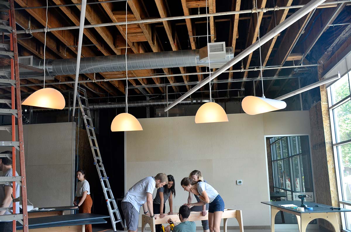 Students design and produce every object, down to the dishes, furniture, lighting, textiles, and utensils for a formal dinner for 60 guests. students work together to set up the feast