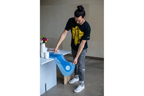 student with table runner