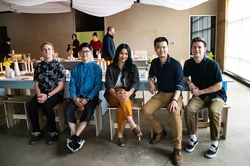 students sitting at table