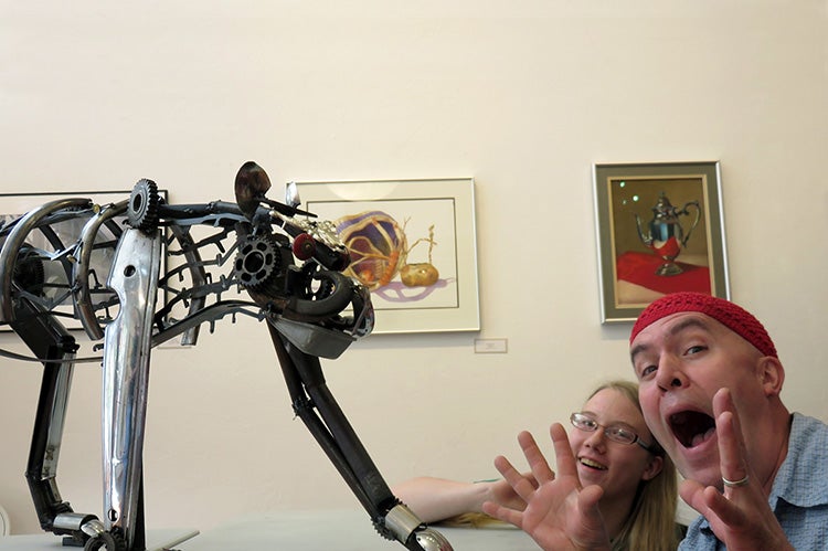 click to enlarge image Alyson Brewer (left) and mentor-sculptor Jud Turner come together to show off their final products.