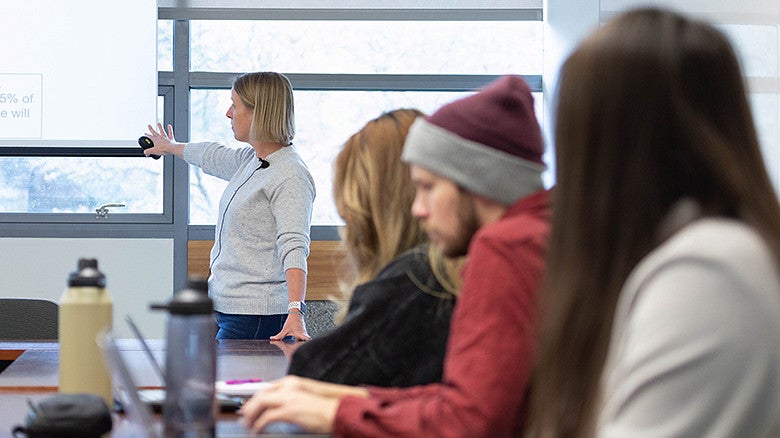 image of individuals in a SPSY class