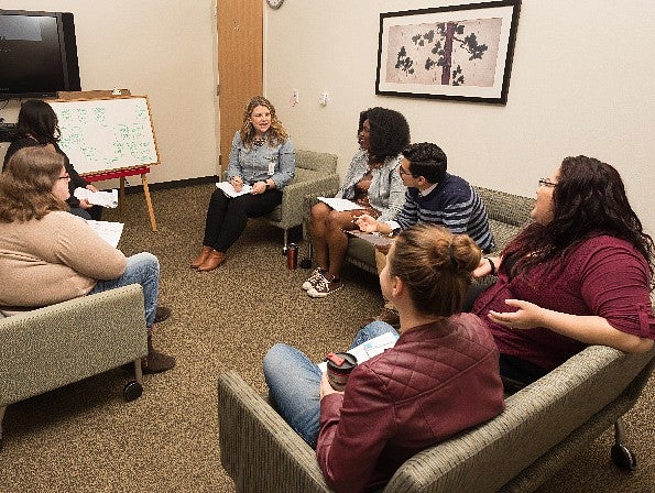 couples and family therapy students sitting and talking