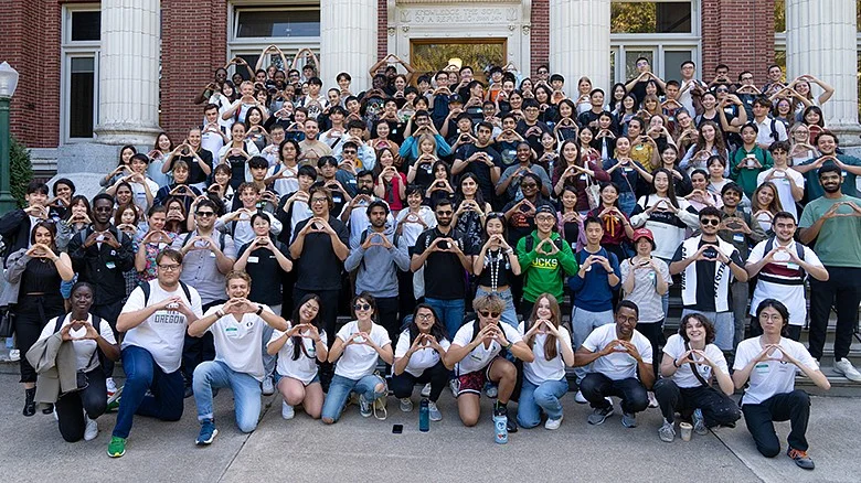 UO international students throwing the Oregon O