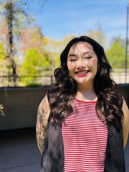 Grace Bonilla facing camera and smiling
