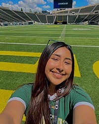 Grecia Acevedo at UO football field