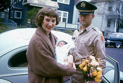 Teresa Osborne as an infant in the arms of her parents