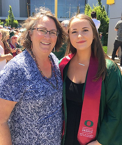 Teresa Osborne with daughter at UO graduation in 2019