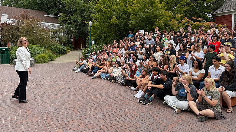 Dean Emily Tanner-Smith with UOTeach students 