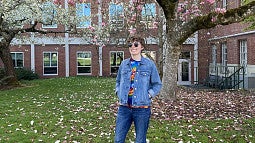 image of student Cedar O’Konski standing in Lokey courtyard
