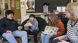 individuals talking while sitting in group discussion