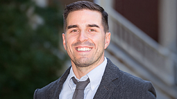 Joseph Nese standing in Lokey Education Building courtyard