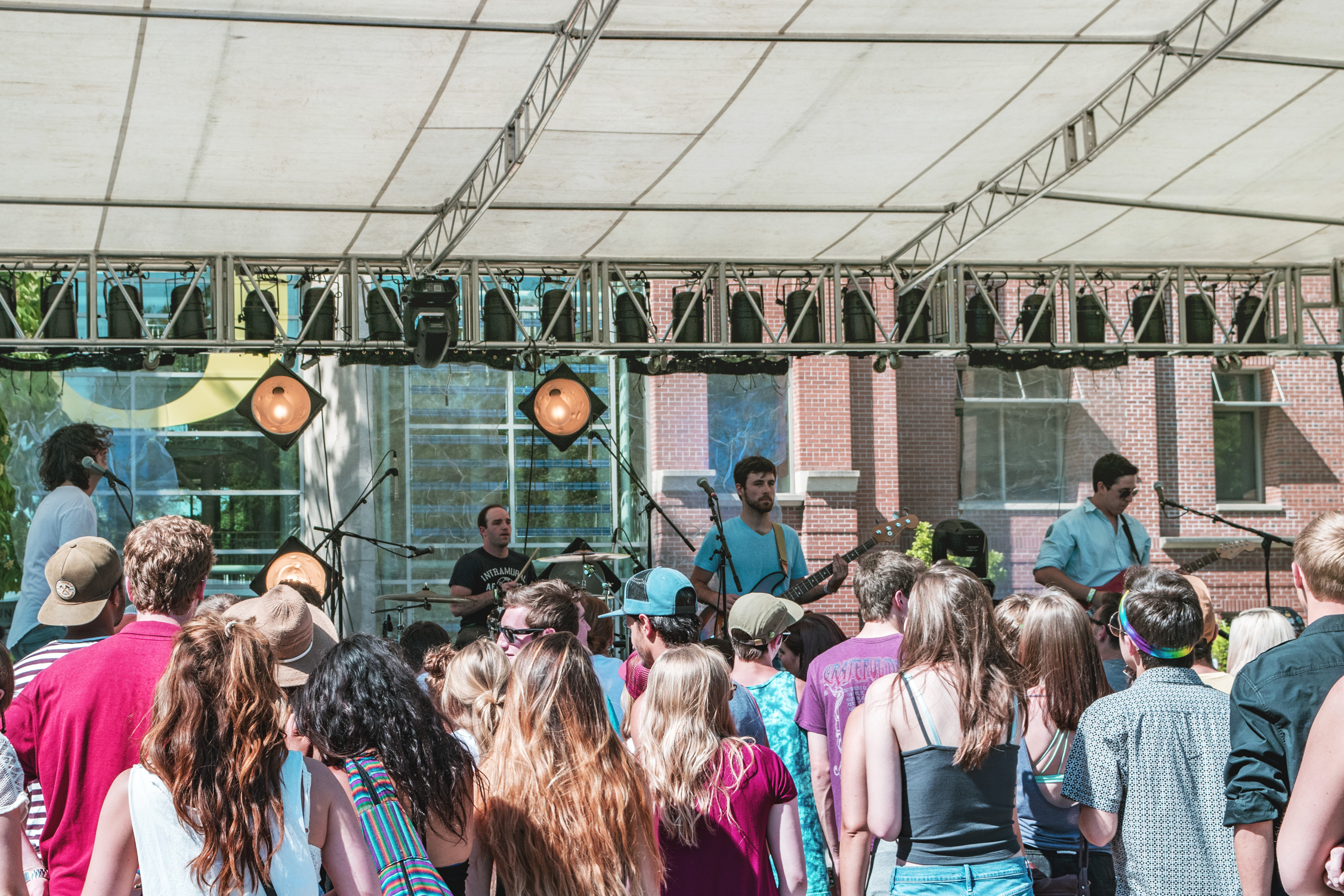 Students attending music festival in front of Lillis Business School.
