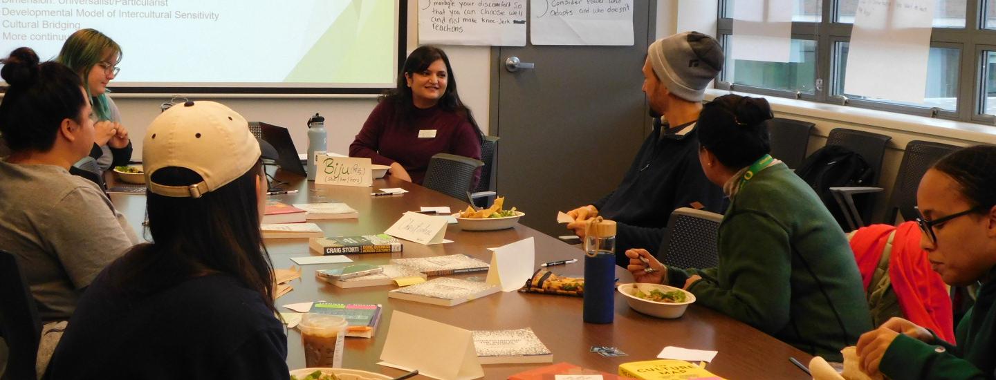 Members of the UO community in a Learning Café small group.