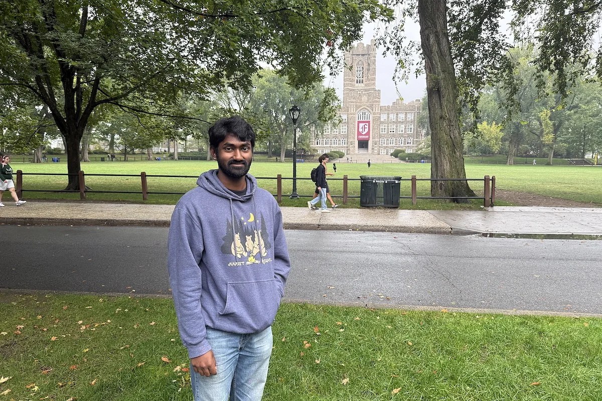 ashish sathya with fordham cathedral in background