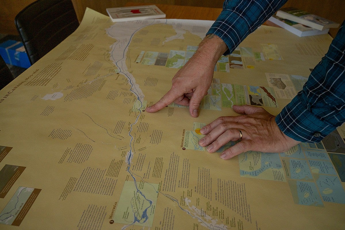 hand pointing on a large map