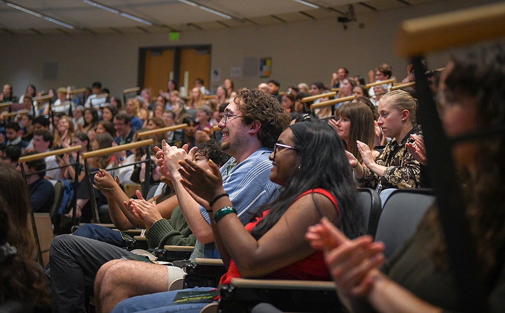 audience members applauding at three minute thesis 2026