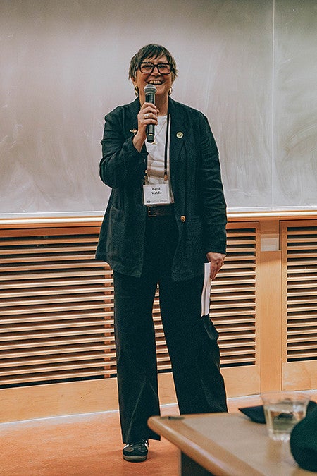 dean carol stabile giving speech at three minute thesis competition