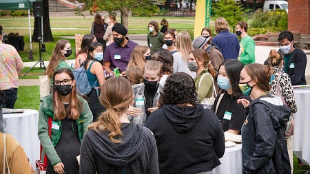 Students mingle and meet each other for the first time. 